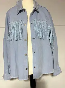 GeeGee women’s M light blue denim jacket embellished w/ blingy fringe.