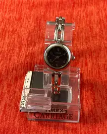 Woman’s brand new in box solid stainless steel carriage by timex watch