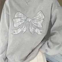 Trendy Bow design gray sweatshirt new in package medium