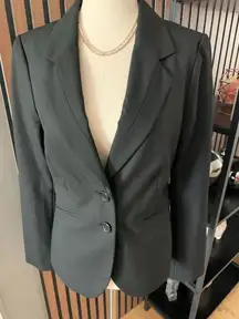 The limited black work blazer size 4 classy form fitting