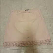 Body Slimmers by Nancy Ganz nude pink lace trim body shaper skirt.