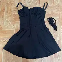 NWT women’s sexy  low top mini dress with adjustable straps in back size S