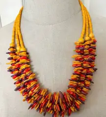 Orange yellow and purple beaded multi strand necklace