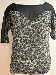 Express cheetah leopard print black and brown top with sheer detailing size S