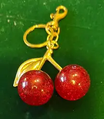 Beautiful red cherry purse, charm, and keychain​
