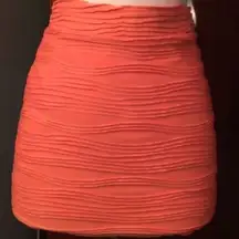 Orange bodycon mini skirt