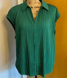 Lush emerald green sleeveless blouse