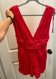 Red open back romper