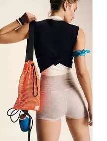 NEW Free People Movement Mini Mesh Sling Bag Orange Functional Athleisure