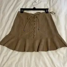 Tan suede skirt. Lace up detailing