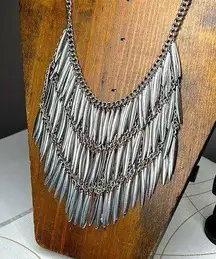 Silver, toned bow, Paul bib necklace