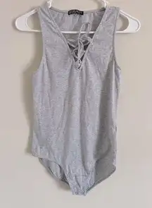 Cotton On  lace up bodysuit size small grey casual basics snap closure