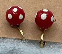 Vintage red polka dot globe clip style earrings.