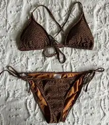 Xhilaration  Size M/L Women’s Cheetah Print Brown and Black Bikini Bottom and Top