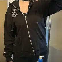 black social tourist sweatshirt