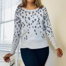 cream sweater with cheetah print