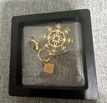 Chanel Gold Snowflake Bag Charm Keychain Limited Edition Holiday CC Charm