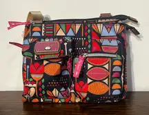 Lily Bloom hobo crossbody bag in the "Karma Bloom" or "Turtle Power" pattern