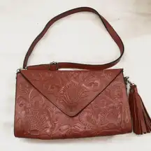 Vintage Red-brown genuine leather saddle shoulder crossbody clutch bag purse with tooled engraved minimalist floral design and crossbody messenger straps - perfect for a boho, western, or hippie look Measurement in pics