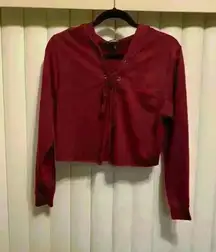 Express Cropped hoodie with cross cross ties in front. Maroon color size XS