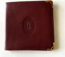 Cartier Authentic  Burgundy Leather Wallet with Gold Accents