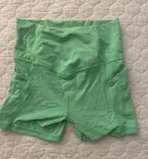 green  biker shorts