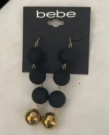 New Bebe Black & Gold Ball Swinging earrings