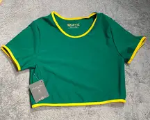 Skatie piper Green swim Top with Yellow Trim NWT