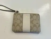 Coach Corner Zip Wristlet In Signature Canvas With Stripe
