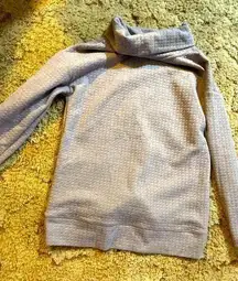 Woman’s waffle knit activewear turtleneck by RBX