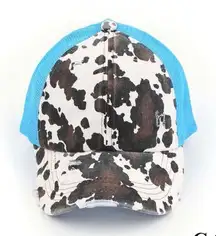 C.C Turquoise & Cow Print Criss Cross Ponytail Hat