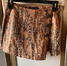 Haute Monde Black and Orange Patterned pleather skort small