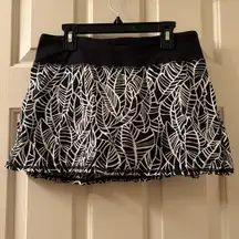 Run Pace Setter Skirt Lined Size 4 Pretty Palm Black Angel Wing