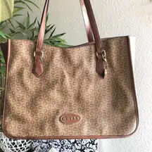 GUESS brown and tan tote monogram hand shoulder bag purse. Some wear as pictured. Great for work school college university. Can fit most books laptops. 