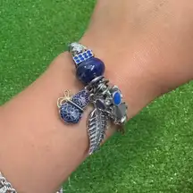 Disney Aladdin Blue and‎ silver beaded charm bracelet