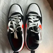 Nike dunks black white and orange