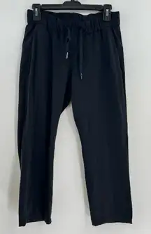 Lululemon On The Fly Crop *23" pants black size 4 full on luxtreme W6AV6S