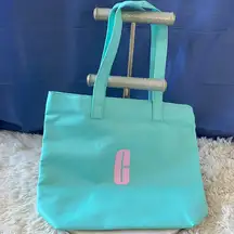 Clinique Turquoise Tote with Pink Logo