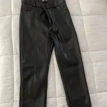 Black faux leather Zara leggings with ankle zippers. Worn once like new.