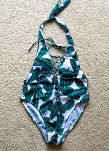 Bright green tropical leaf print onepiece swimsuit