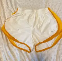 Nike dri fit white and yellow shorts 