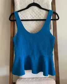 blue textured cotton blend peplum style sleeveless top