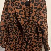 Animal print warm sweater like coat with pockets