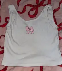 White tank top with pink bow detail