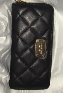 Padded clutch with classy plating on the front