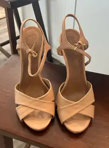 Beautiful, nude color Tory Burch heels.