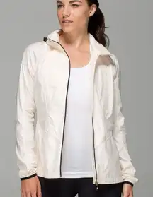 Lululemon Cream and Black rain back pack it Jacket