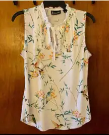 White Sleeveless Floral Pattern Blouse