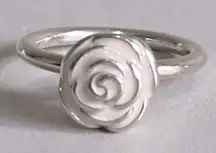 Pandora Silver Rose with pale pink inlay.