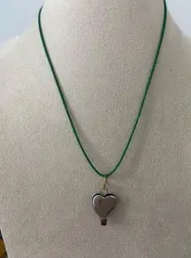 Silver tone heart pendant necklace